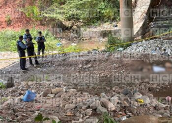 Por ladrón, el rótulo que fue encontrado junto a un hombre asesinado bajo un puente en el bulevar Kuwait de TGU